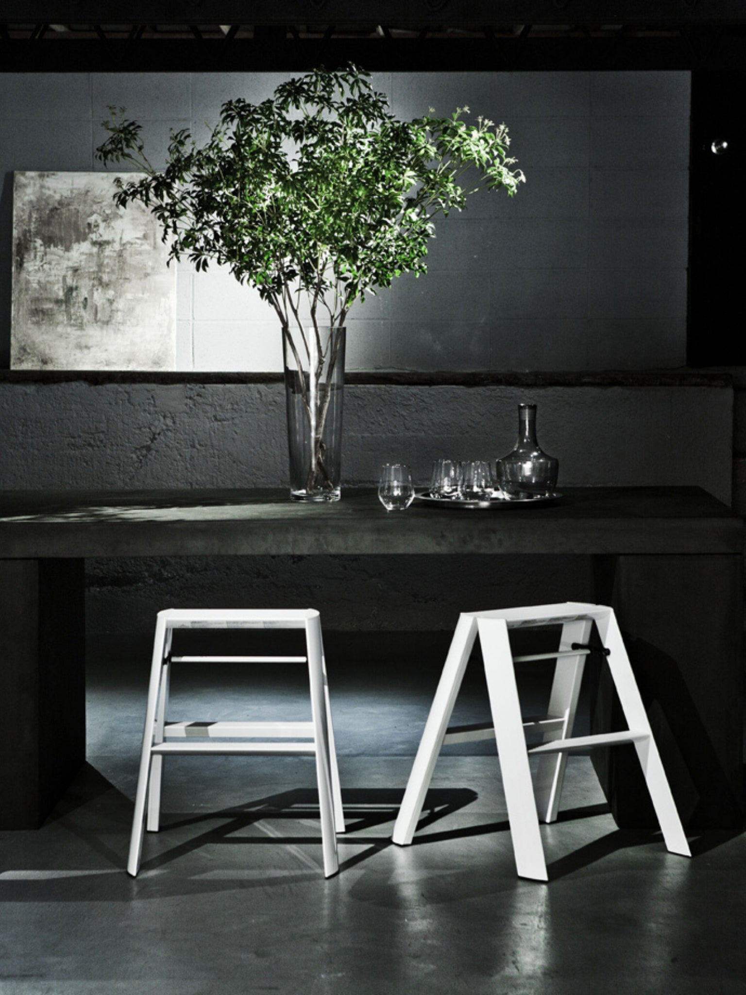 lucano ladders die gebruikt worden als stoelen aan een tafel